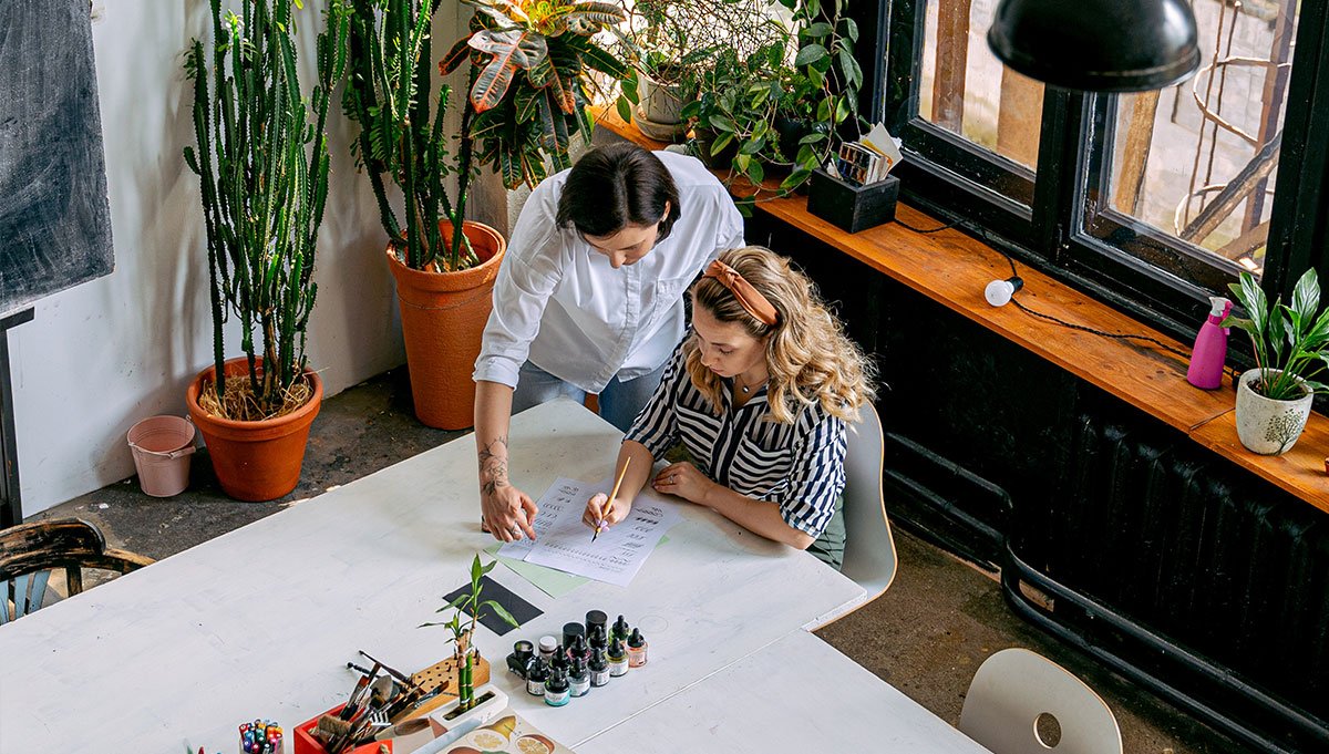 Two women working
